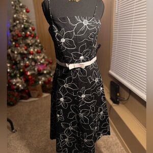 Rave Black and White Floral Dress with Bow Lining
